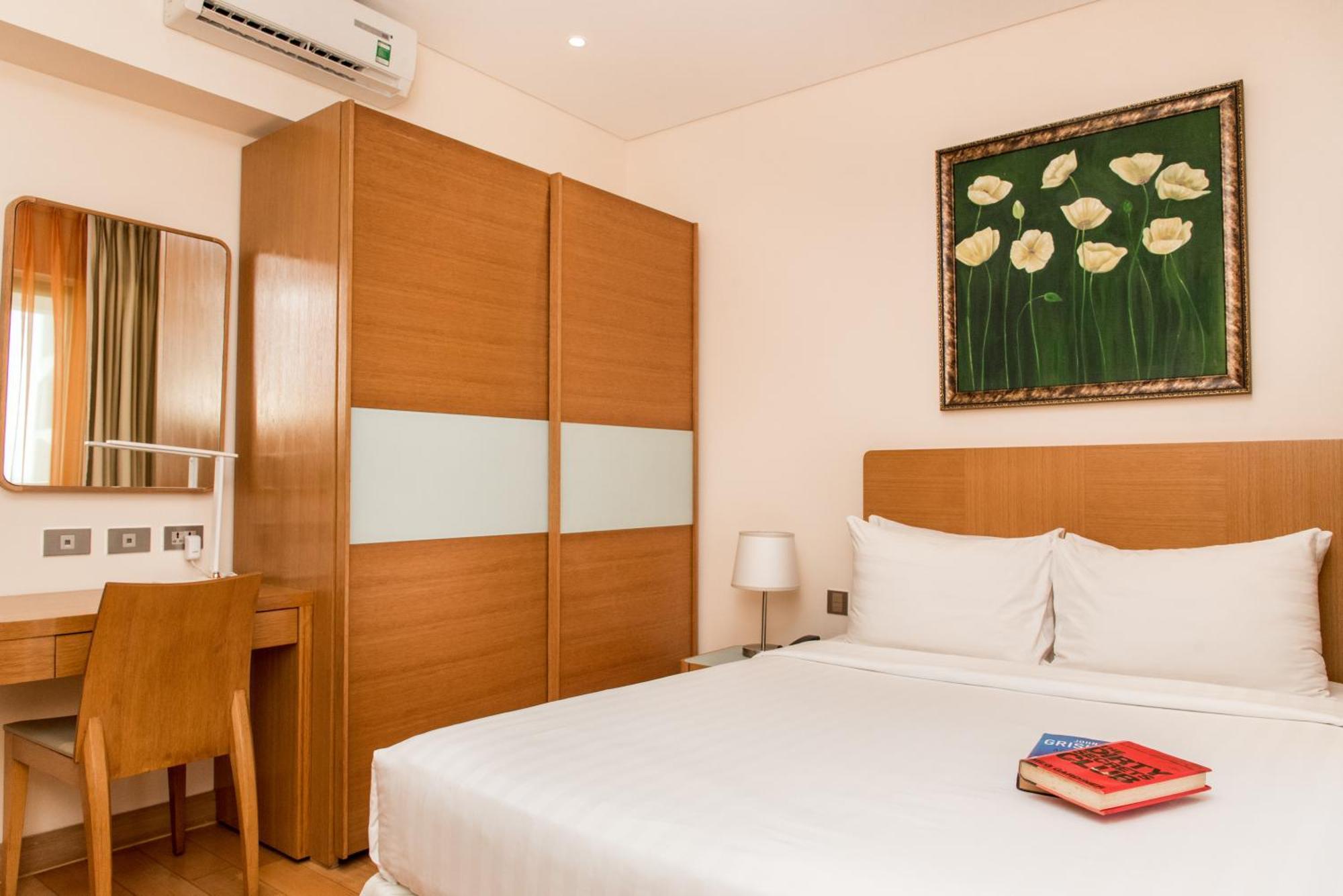 舍伍德公寓式酒店 胡志明市 外观 照片 A bedroom at the hotel