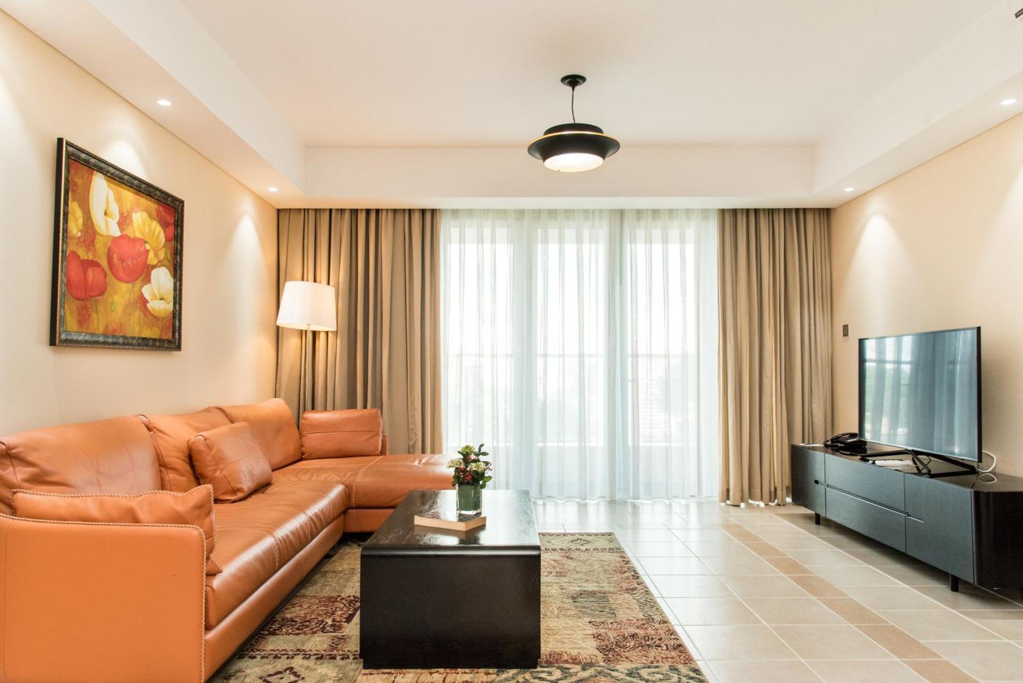 舍伍德公寓式酒店 胡志明市 外观 照片 A living room in a hotel