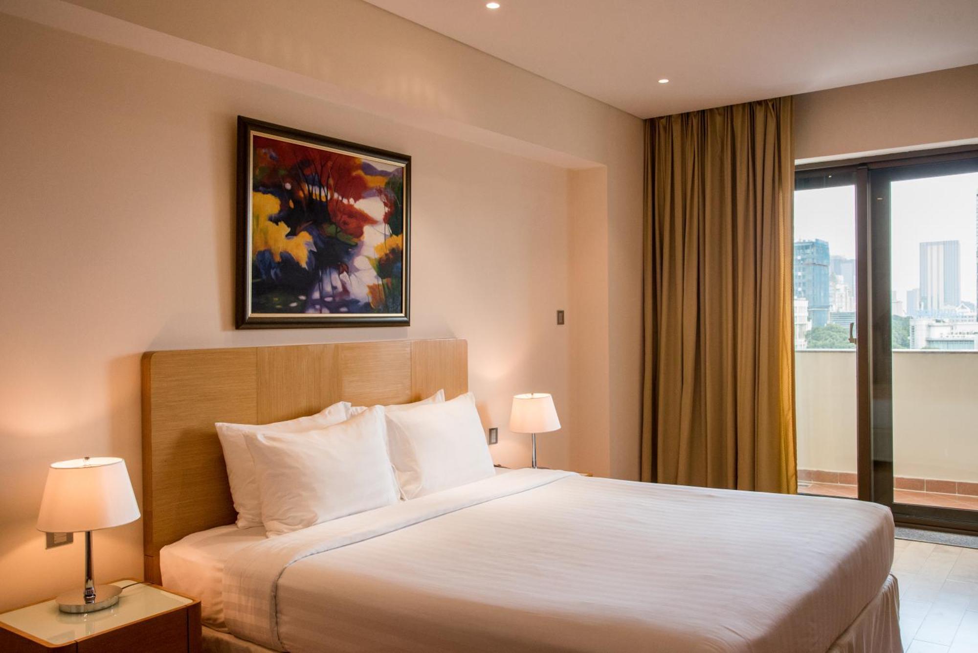 舍伍德公寓式酒店 胡志明市 外观 照片 A bedroom at the hotel